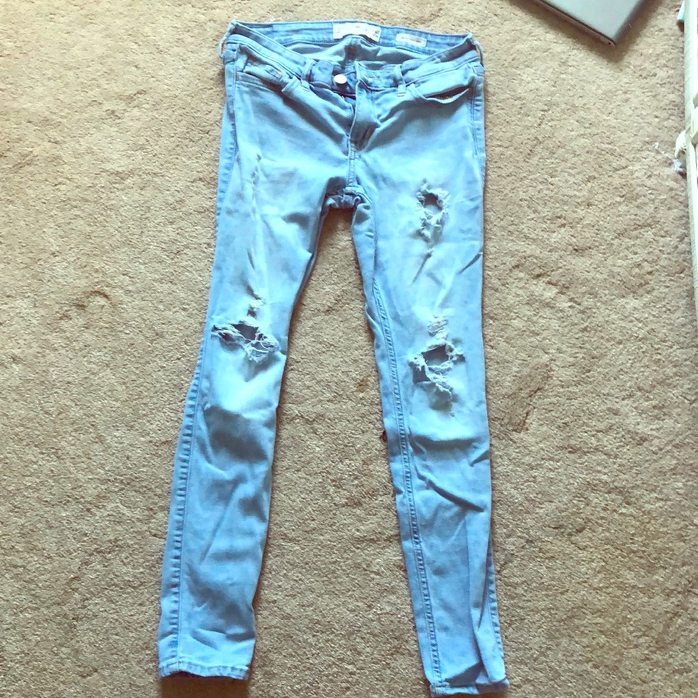 light wash low rise super skinny ripped jeans.